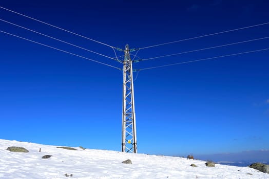 Power lines in mountains