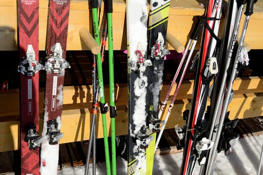Skis by mountain chalet