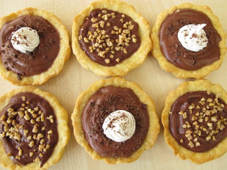 Chocolate tartlettes and almond tartlettes