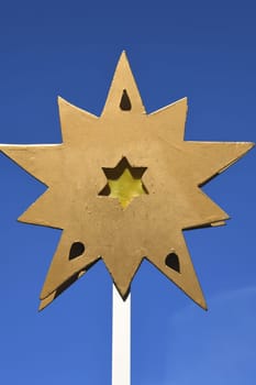 A star indicated the way to Bethlehem for the Three Wise Men. Carol singers go from house to house collecting donations for projects in poorer countries.
