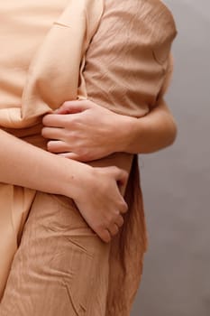 Business woman holding fabric rolls, working at textile shop