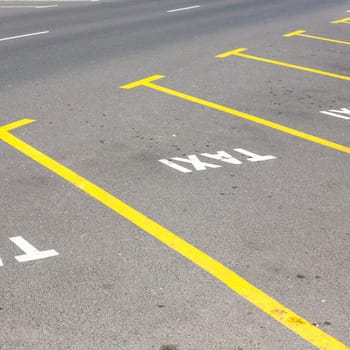 taxi parking lot marked at the street