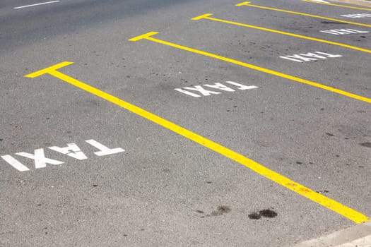 taxi parking lot marked at the street