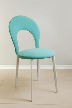 Contemporary modern kitchen armchair with velour upholstery.