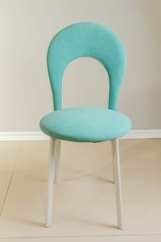 Contemporary modern kitchen armchair with velour upholstery.