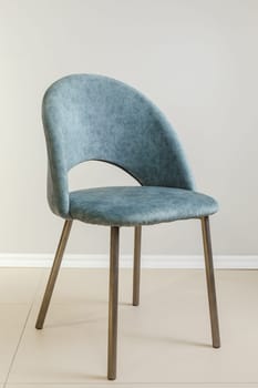 Contemporary modern kitchen armchair with velour upholstery.