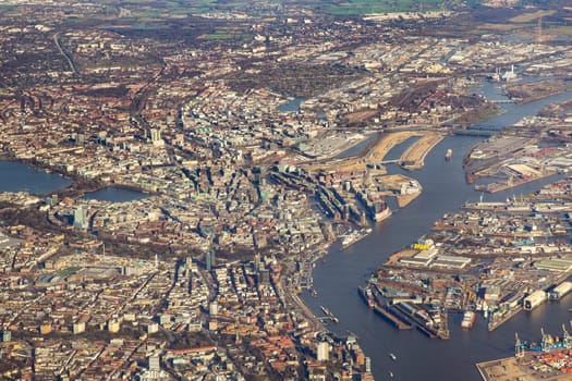aerial of Hamburg harbor with river Elbe and docks