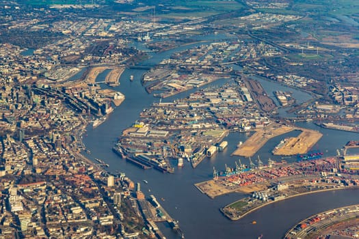 aerial of Hamburg harbor with river Elbe and docks