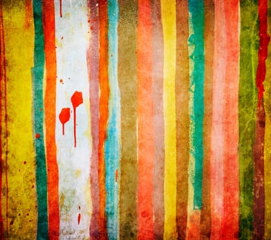 Concrete grunge wall painted with colorful stripes