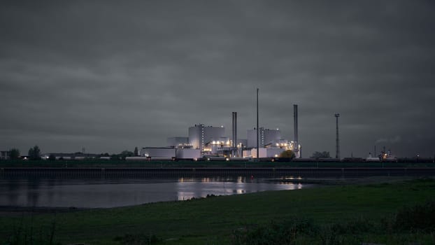 Waste-to-energy plant in Magdeburg in the district of Rothensee on the banks of the river Elbe in the evening