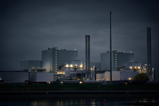 Waste-to-energy plant in Magdeburg in the district of Rothensee on the banks of the river Elbe in the evening
