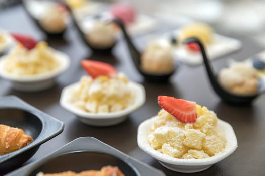 Collection of delicious assorted mini dessert. Wedding catering.