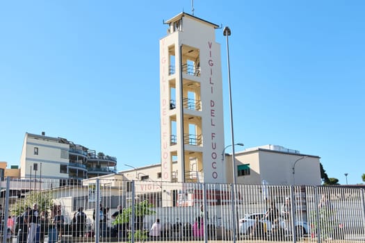 Civitavecchia, Italy - December 19, 2024: The Vigili del Fuoco training facility in Civitavecchia features a tall tower for firefighter drills, focusing on fire station training, response and safety.
