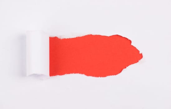 White torn paper, red background, empty copy space, ripped sheet