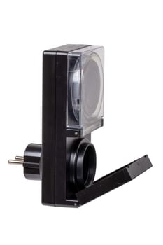 Smart home for home and garden. Mechanical 24 hour timer for outdoor sockets isolated on white background. Clipping path. Macro.