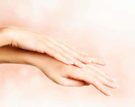 Female hands with french manicure