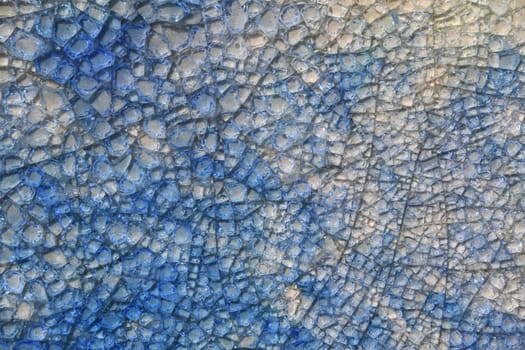 A blue,light blue,gray background made of glass