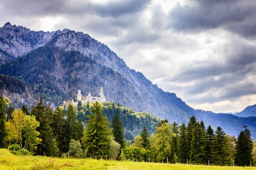View of the Neuschwanstein Castle and the surrounding mountains in Bavaria