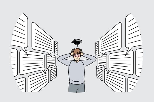 Too much information and communication concept. Young stressed man cartoon character standing touching head with many speech bubbles on each sides vector illustration