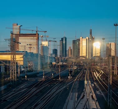 entering the frankfurt train station in sunset