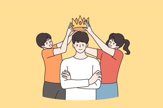 Happy kids put crown on loving father head