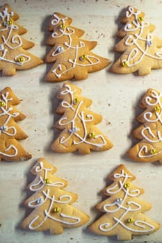 Perfect ginger bread Christmas cookie shaped as a Christmas tree. Top view
