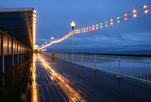 The lights on Bournemouth pier on a cold wet night