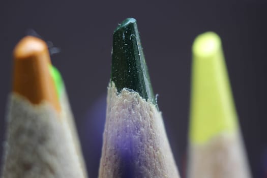 close up of sharpened pencil.Macro view of the tip of the pencil on a black background.