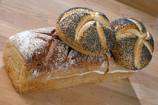 wheat bread on a wooden counter