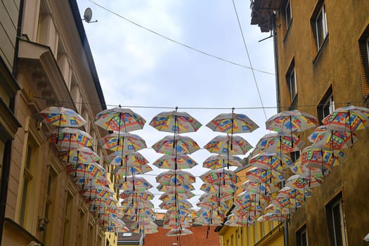 BRATISLAVA, SLOVAKIA - JUNE 8, 2020: Umbrellas above the street in Bratislava's Old Town district.