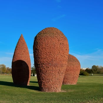 piled up bricks from the ruins of the second world war in the Elbauenpark in Magdeburg. Today's Elbauenpark became a storage area for rubble from destroyed Magdeburg after the war. This rubble was included in the design.