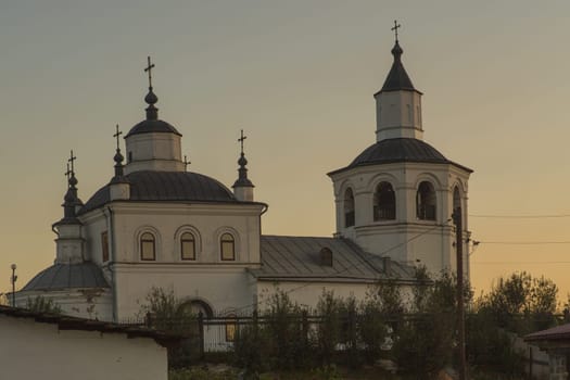 Snow-white ancient temple of Elijah the Prophet from the village of Ilyinka, Novokuznetsk district.
