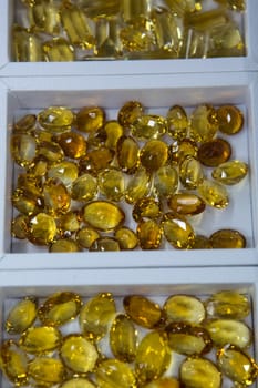 Artificial jewelry stones in the jewelry store window.