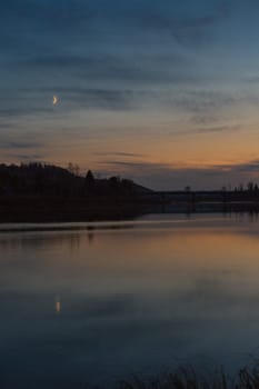 Summer sunset on the river , sunset by the water.