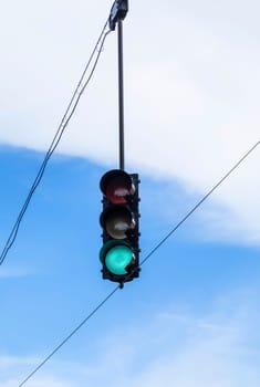 overhead traffic light under blue sky