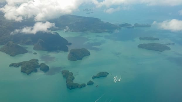 View from above on many green islands, sea and clouds, langkawi, malaysia