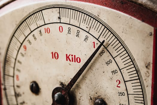 Close-up shot of retro and vintage scale or balance indicating weight in kilo.