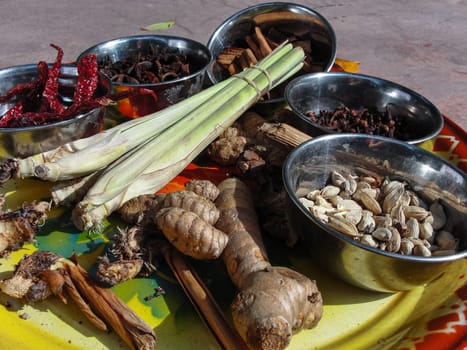 Various spices in iron bowls on the market for curry, set, still life