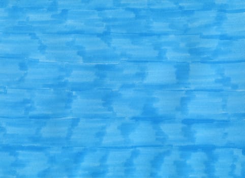 closeup of permanent blue marker doodles brushes on white background