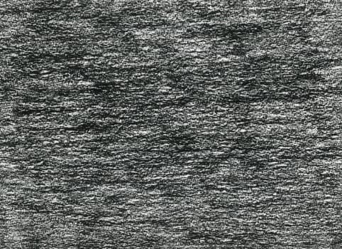 closeup of heavy black pencil horizontal doodles brushes on white background