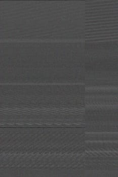 The image displays noise patterns consisting of horizontal and vertical lines and bands. This phenomenon can be caused by electromagnetic interference or issues in digital signal processing and is of interest to engineers and technicians working to improve image quality and data transmission.
