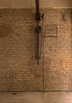 Chain hoist for lifting weights in an old factory