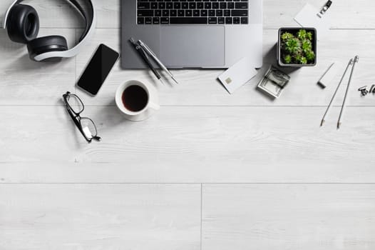 Workspace with office supplies and gadgets. Copy space for your text. Flat lay.