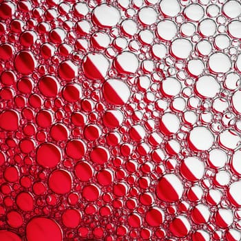 Abstract red bubbles texture. Foam bubbles macro background.