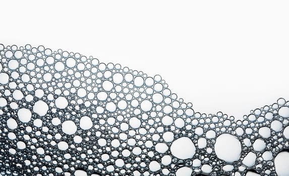Water bubbles background. Detergent in water. Flat lay.