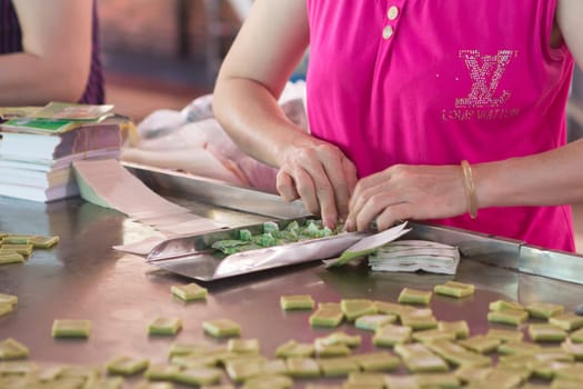Ben Tre, Vietnam. Coconut Candy Making in Ben Tre, Con Phung, Phoenix Islet.