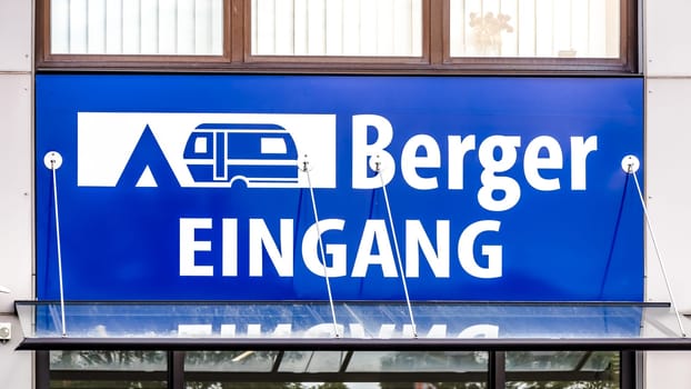 GIESSEN, GERMANY, 2021-06-10 BERGER LOGO on a Camping BERGER warehouse in GIessen. Fritz Berger offers camping supplies and equipment.