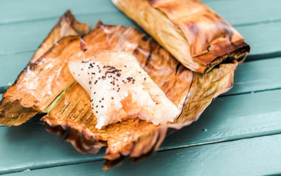 Thai traditional dessert. Grilled Taro Stuffed Coconut Sticky Rice