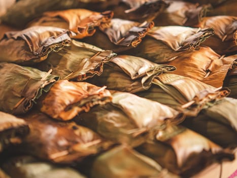 Thai traditional dessert. Grilled Taro Stuffed Coconut Sticky Rice