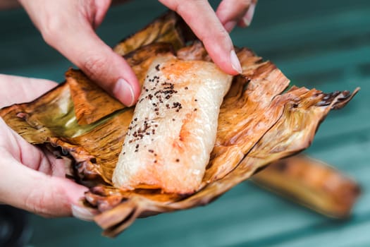 Thai traditional dessert. Grilled Taro Stuffed Coconut Sticky Rice